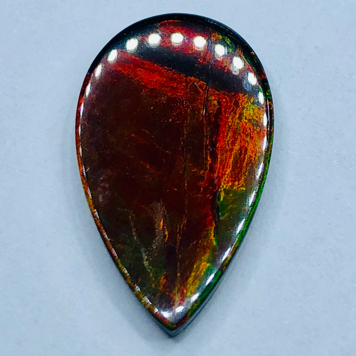 Genuine Ammolite "Canada's Opal " 22x13mm Triplet Vivid Red Gem