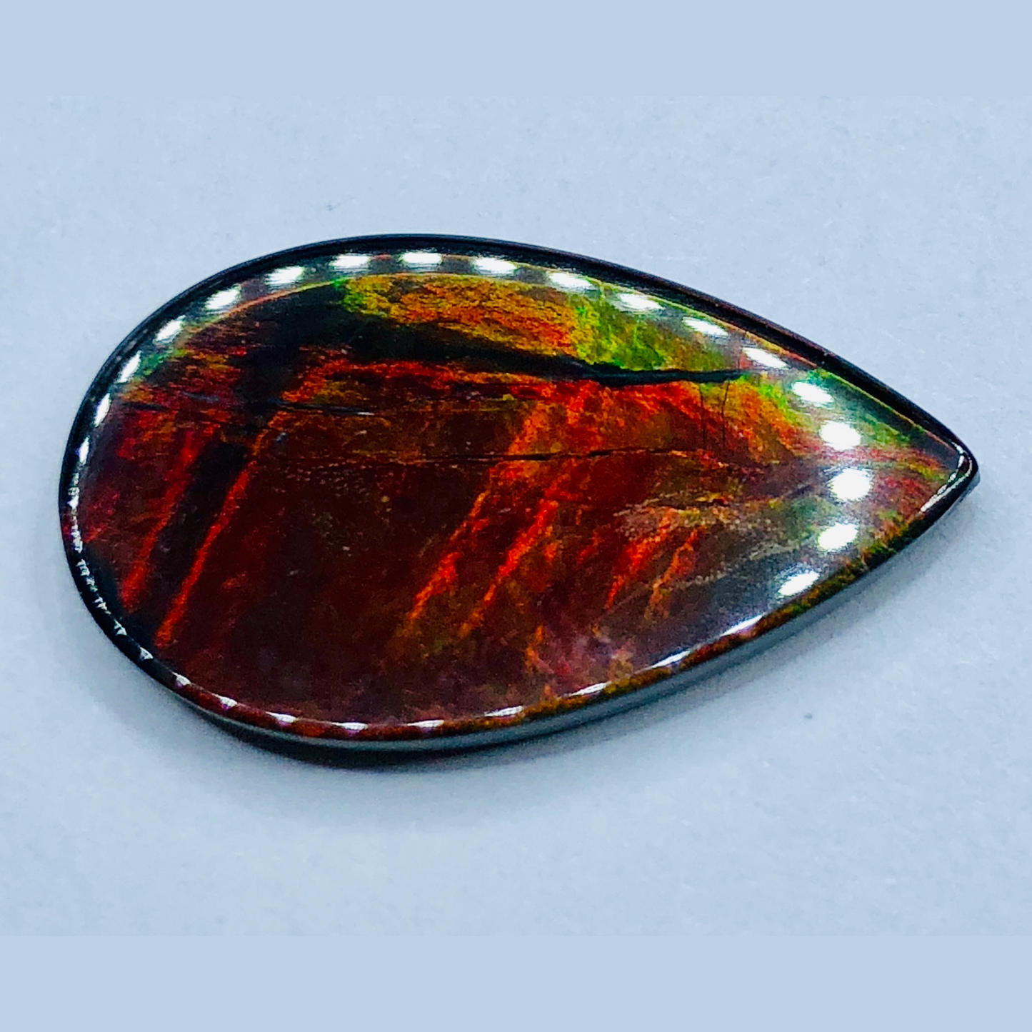 Genuine Ammolite "Canada's Opal " 22x13mm Triplet Vivid Red Gem