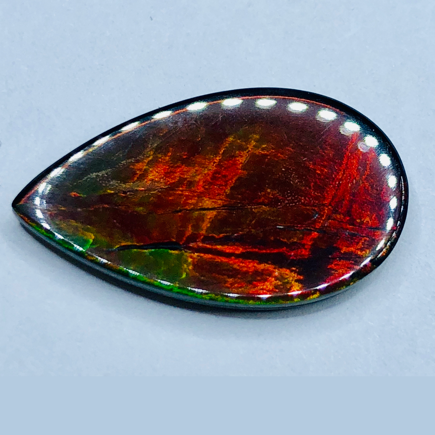 Genuine Ammolite "Canada's Opal " 22x13mm Triplet Vivid Red Gem