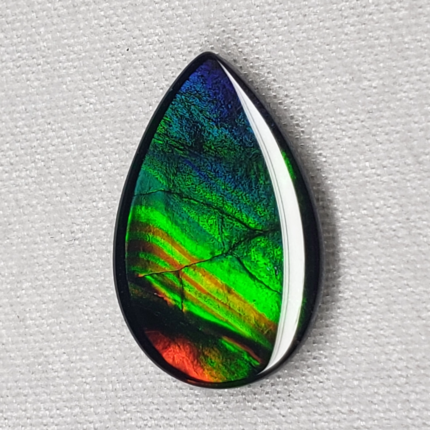 15x10mm Pear Ammolite – Blue Green Gold Red Gem – Canadian Rainbow Fossil