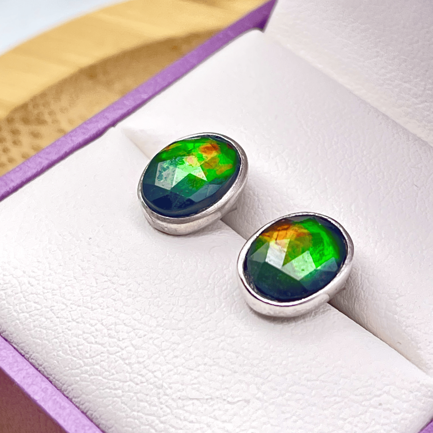 Ammolite Faceted Oval Gemstone Studs in Sterling Silver