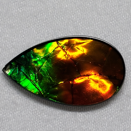 Pear-Shaped Green & Gold Ammolite – 22x13mm Triplet Gem from Canada – Rare Dragon Skin Gemstone for Jewelry Making