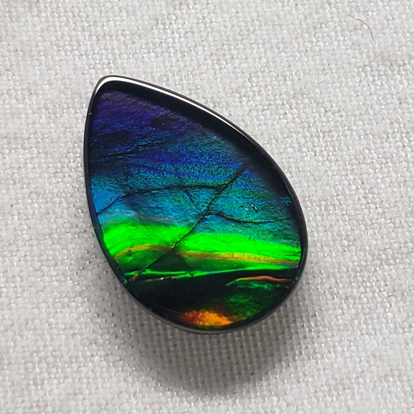 15x10mm Pear Ammolite – Blue Green Gold Red Gem – Canadian Rainbow Fossil