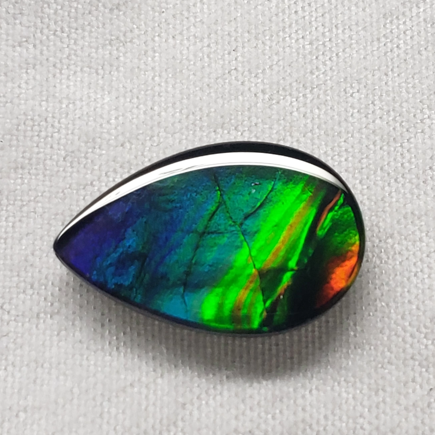15x10mm Pear Ammolite – Blue Green Gold Red Gem – Canadian Rainbow Fossil