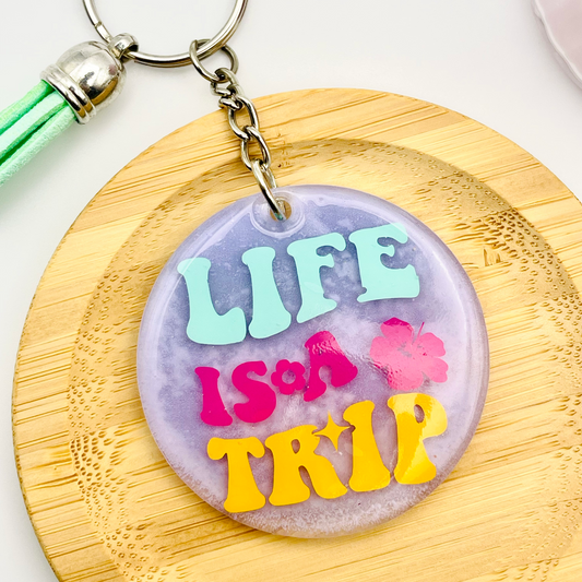 Life is a Trip Purple Acrylic Resin Keychain – A Bold & Vibrant Reminder to Enjoy the Ride!