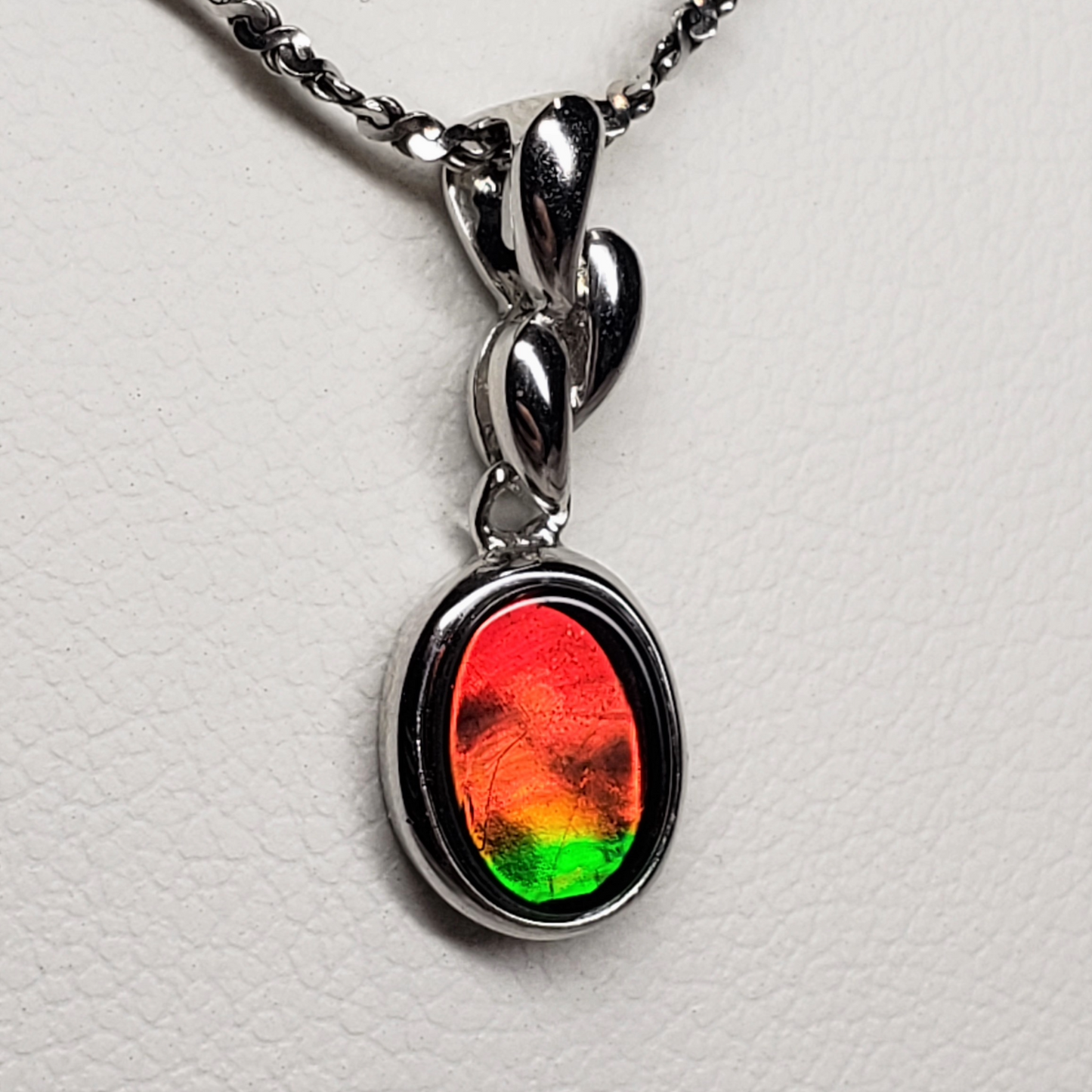 Classic Oval Ammolite Sterling Silver Pendant featuring a 7x9mm Triplet Gem