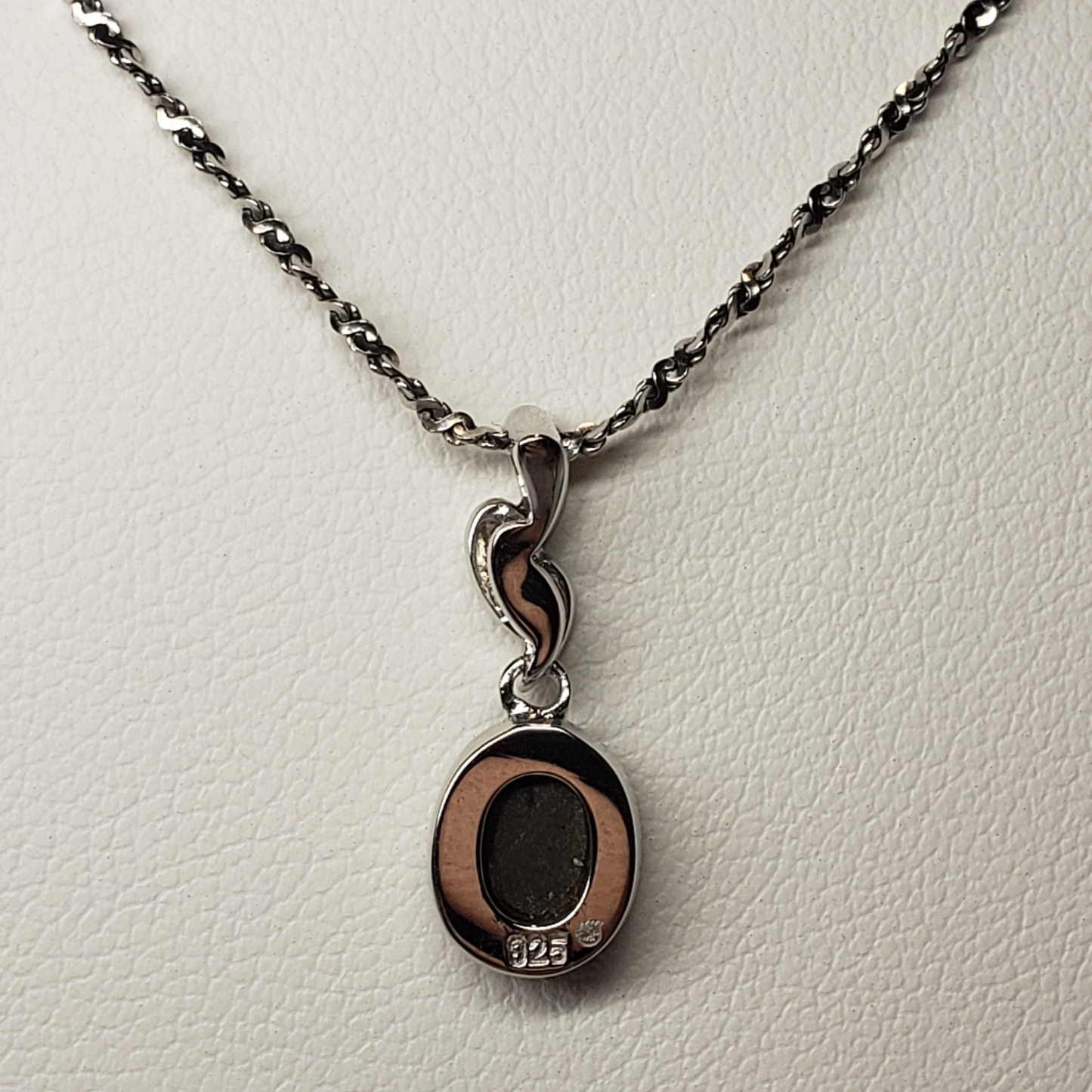 Classic Oval Ammolite Sterling Silver Pendant featuring a 7x9mm Triplet Gem