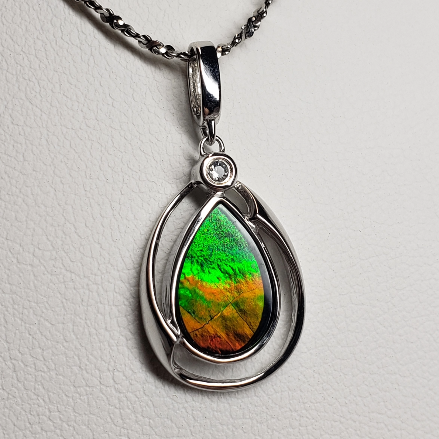 Sterling Silver Teardrop Ammolite 13x20mm Pendant – 9x13mm Green & Orange Gem with White Sapphire Accent