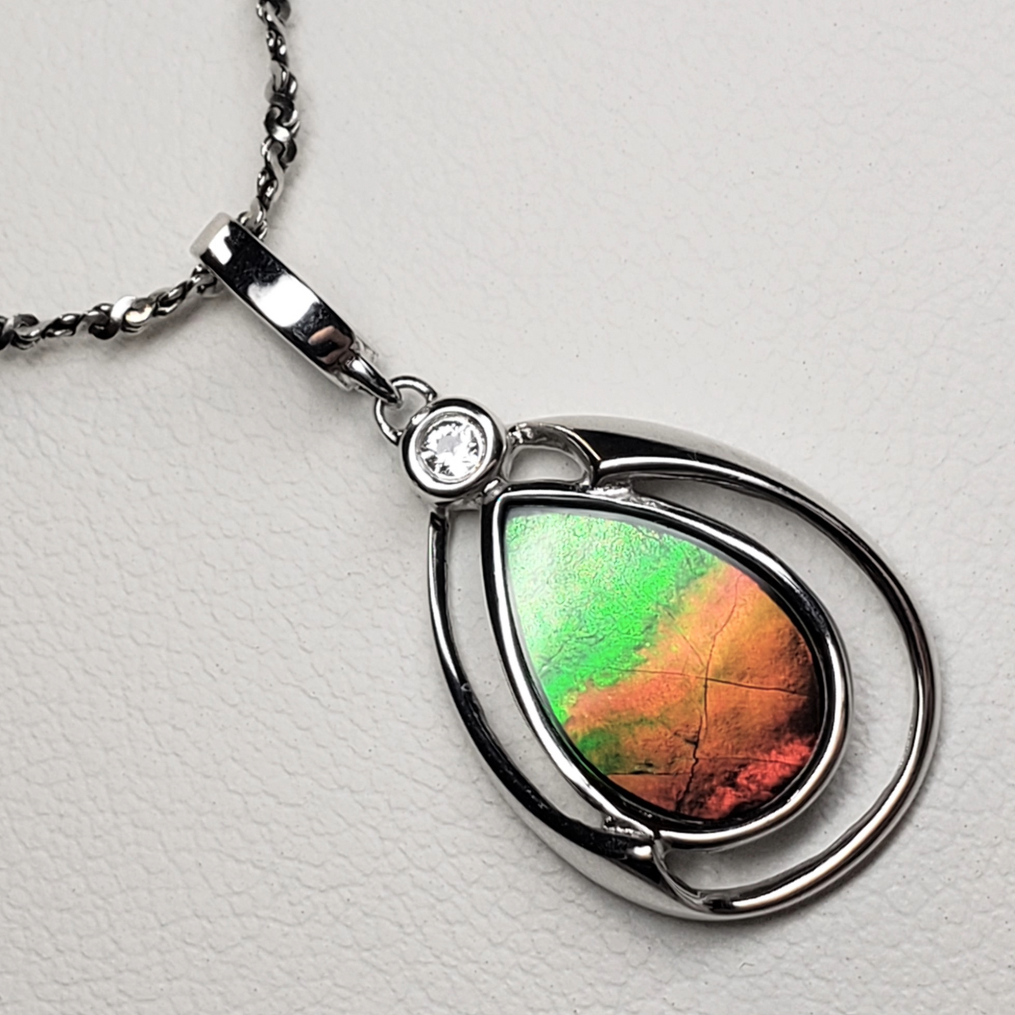 Sterling Silver Teardrop Ammolite 13x20mm Pendant – 9x13mm Green & Orange Gem with White Sapphire Accent