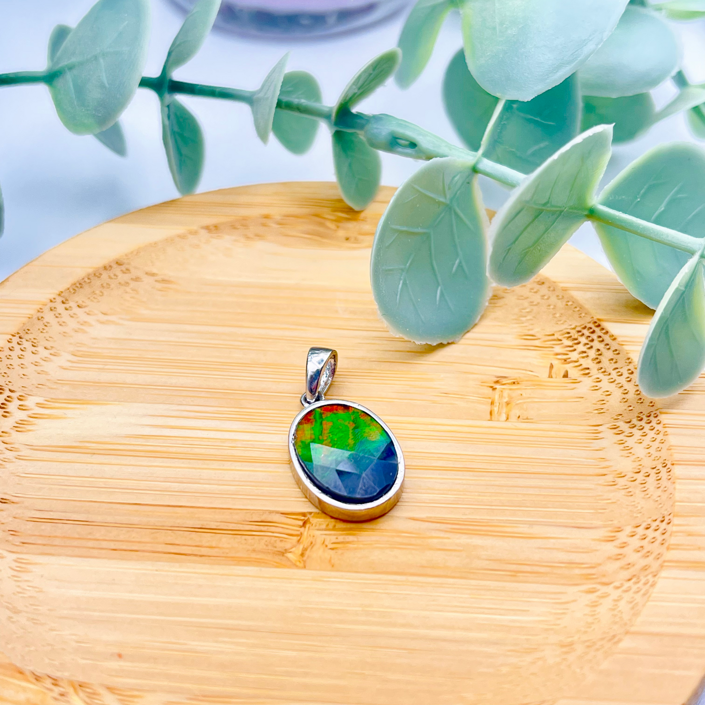 Faceted Oval AA Grade Ammolite Sterling Silver Pendant – Red, Green & Blue 10x14mm Triplet Gem