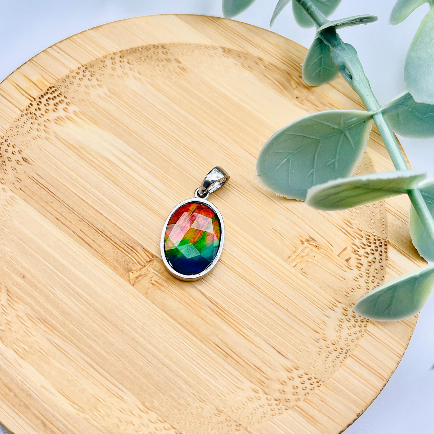 Faceted Oval AA Grade Ammolite Sterling Silver Pendant – Red, Green & Blue 10x14mm Triplet Gem