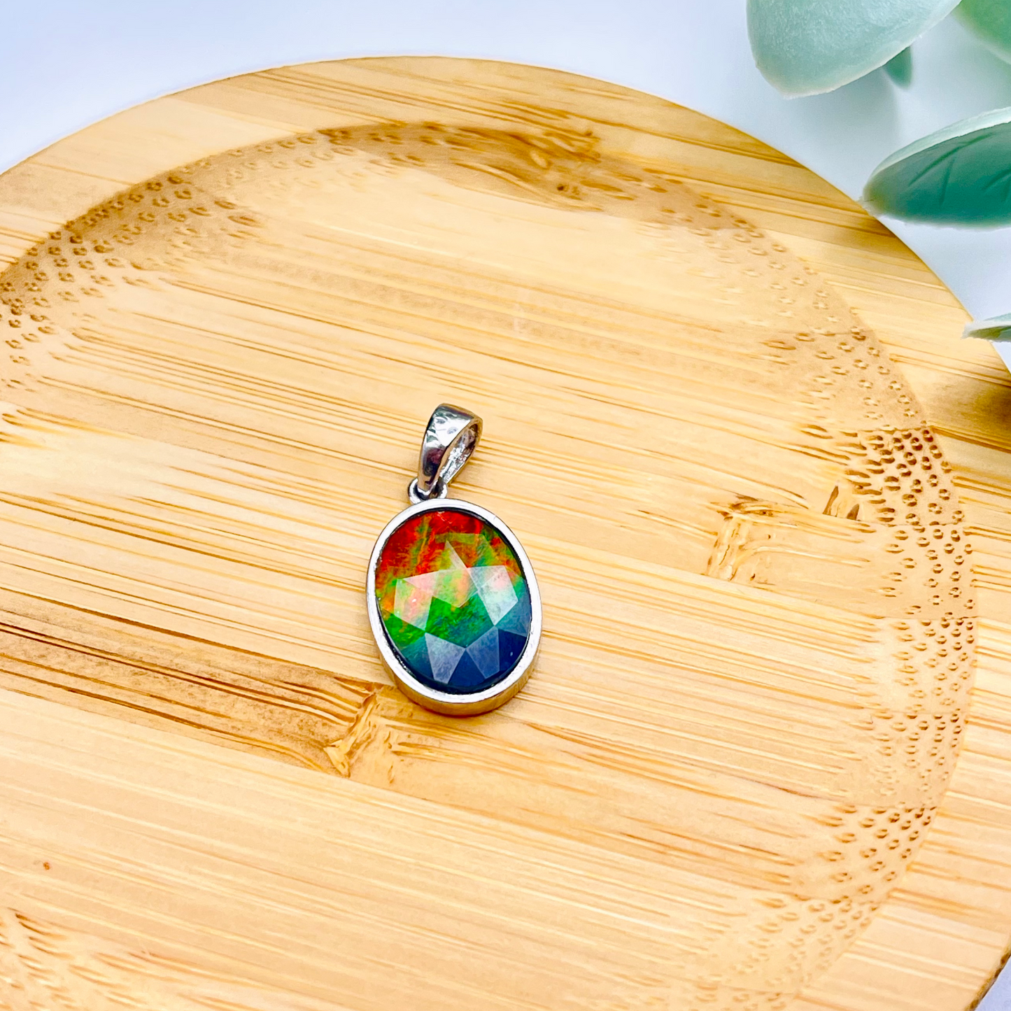 Faceted Oval AA Grade Ammolite Sterling Silver Pendant – Red, Green & Blue 10x14mm Triplet Gem