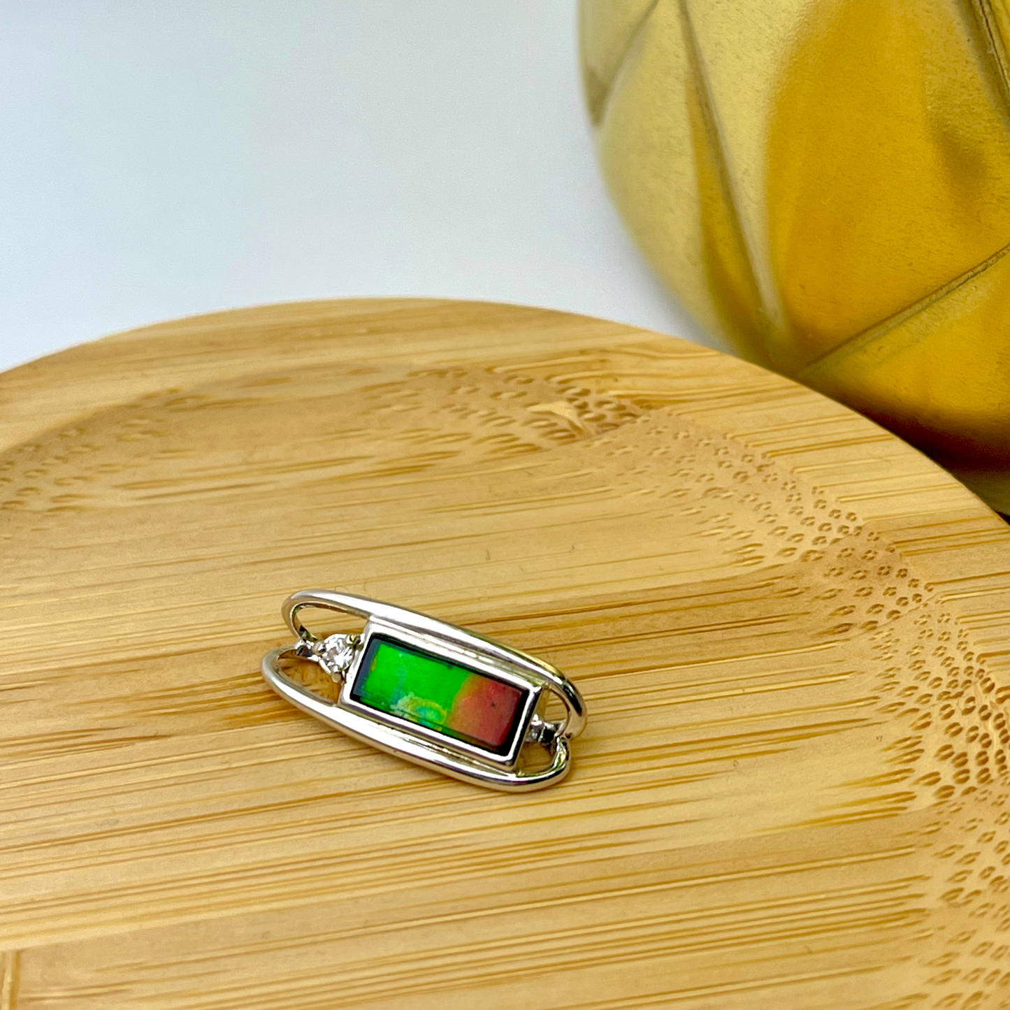 Genuine Canadian Ammolite 4x10 rectangular Sterling Silver Pendant with white Sapphire
